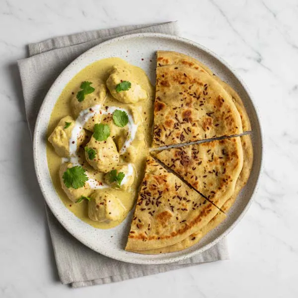 Dahiwala murgh with Carom seed Paratha